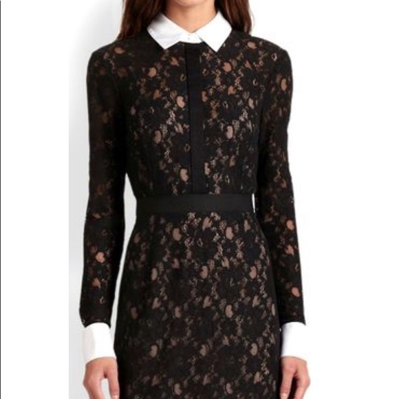 black dress with white lace collar and cuffs